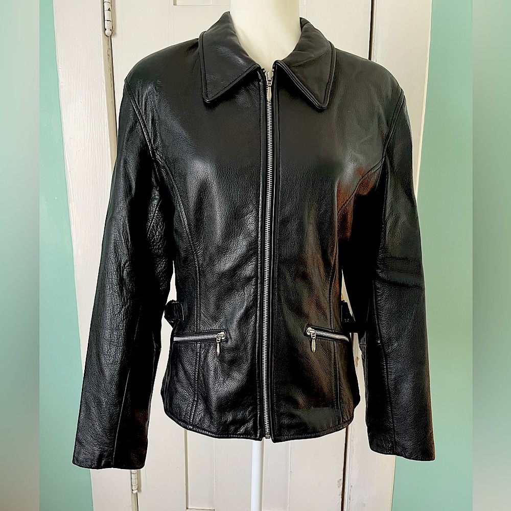 Women’s fitted black leather jacket, sz. Medium, silver zippers and buckles
